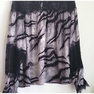 WHBM lace detail top , worn one time size small but fits more like a medium